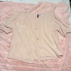 a light pink xxs shirt from h&m